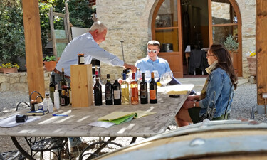 Clients enjoying a wine tasting in Tuscany