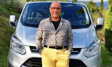 Tuscany wine tour driver Sergio Ceccherini with his van