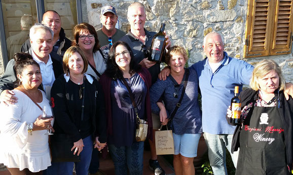 Group of People at a Wine Tasting in Tuscany