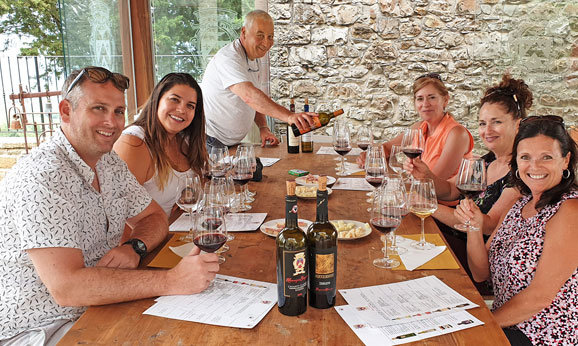 Tuscany Wine Tour Guests Enjoying Tasting