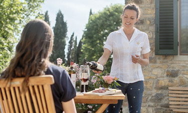 Pouring wine at a tasting
