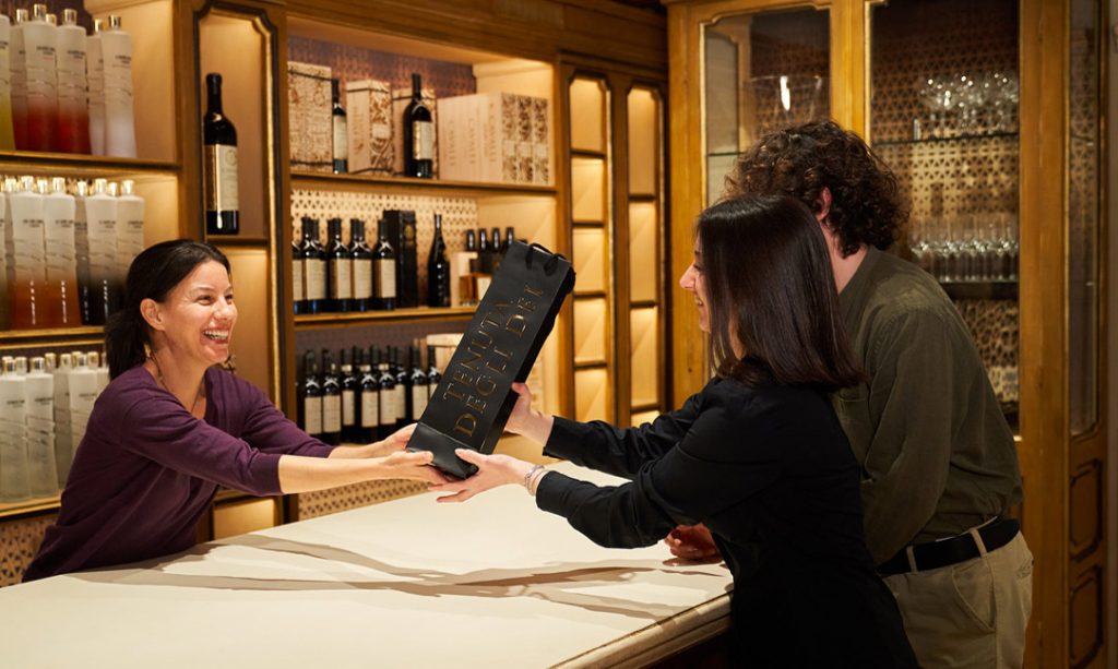 Clients buying wine on Sergio's Extra Private Premium Wines Tour